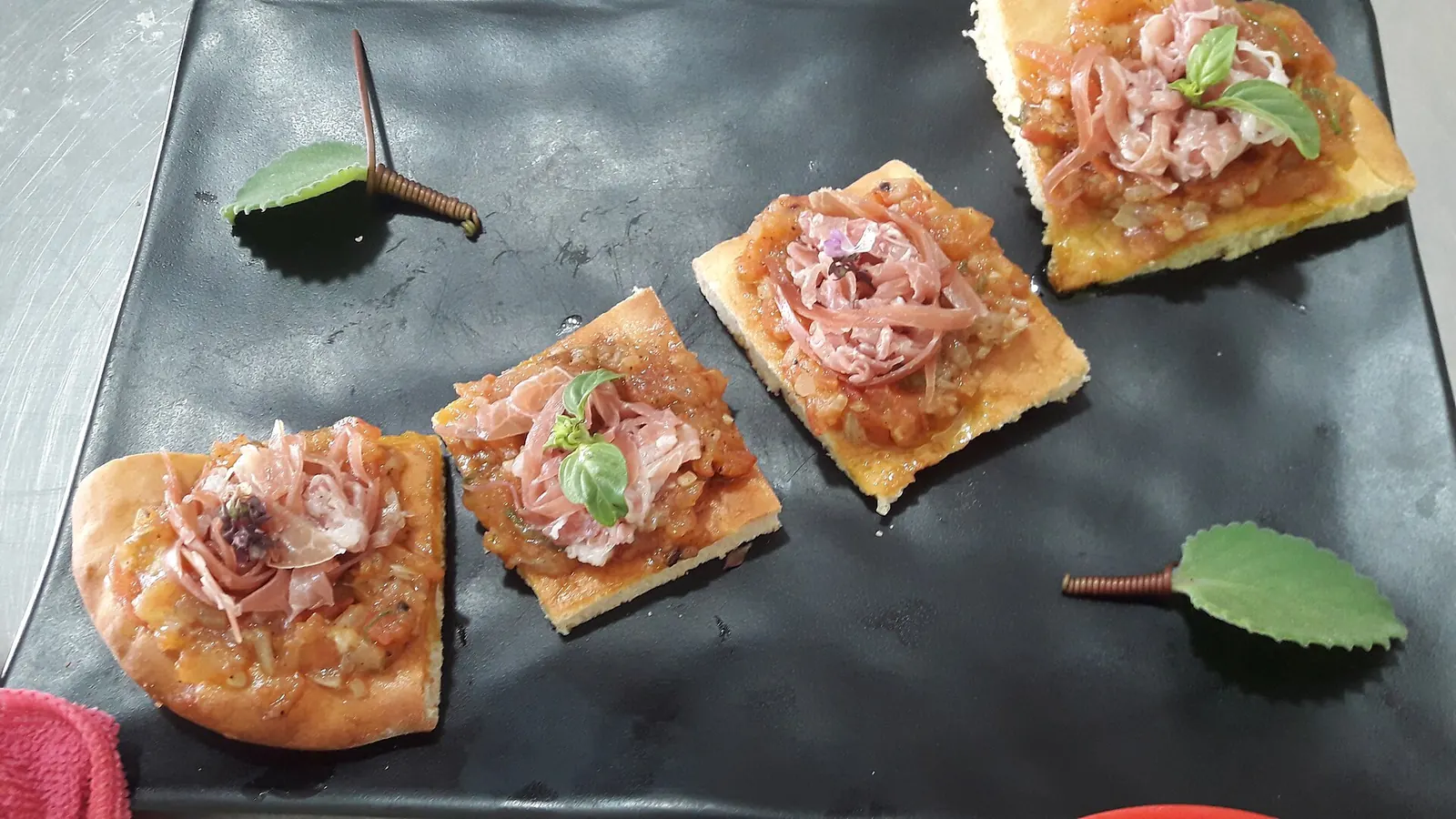 Small canapés on a black slate